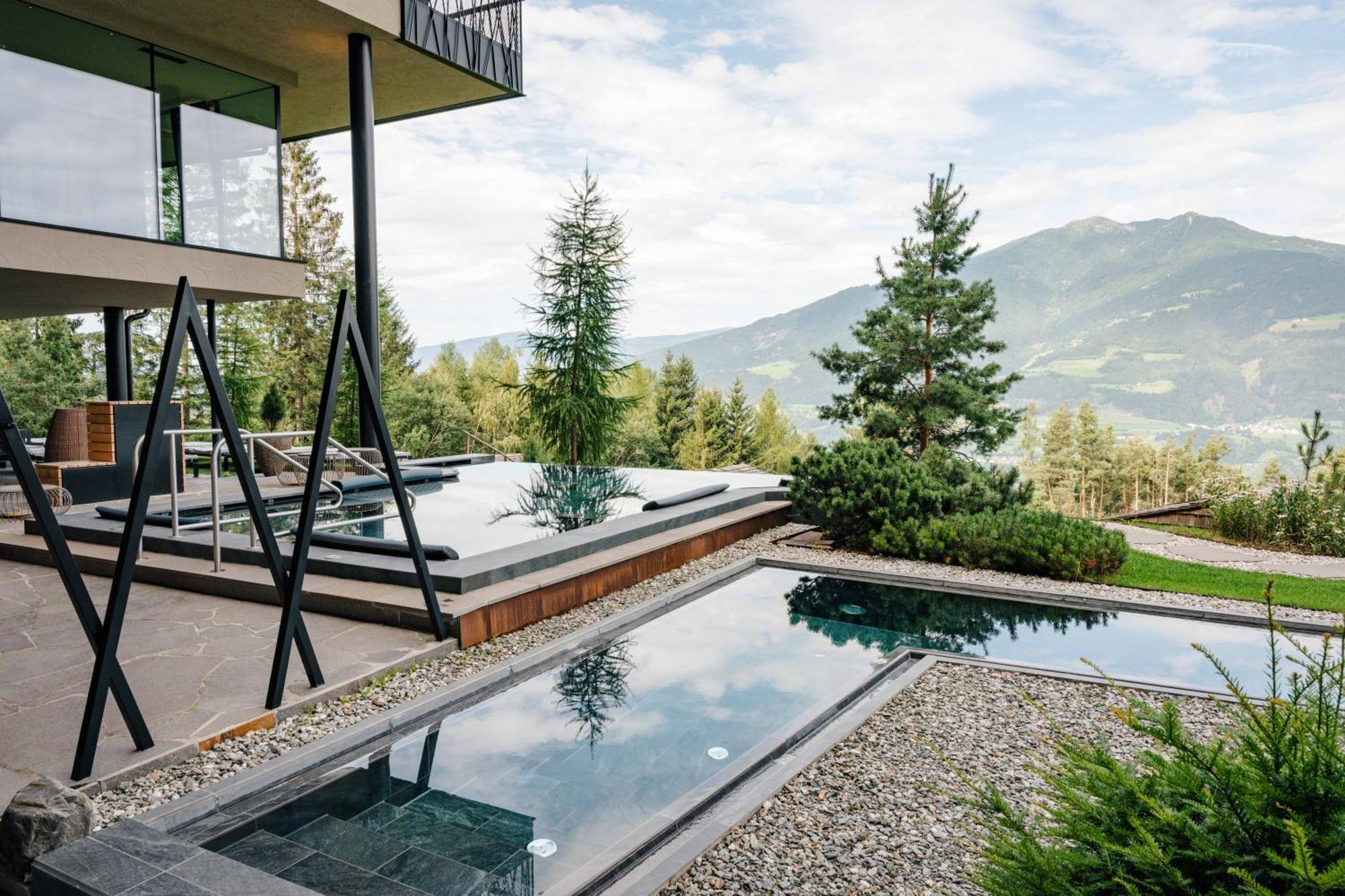 My Arbor - Dolomites Hotel Bressanone Luaran gambar A private swimming pool in the Alps